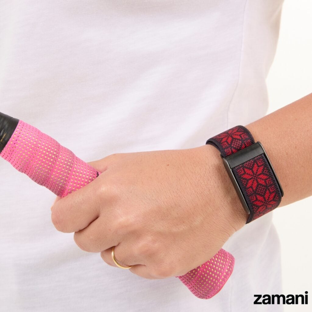 Tatreez WHOOP band by zamani, worn on the wrist