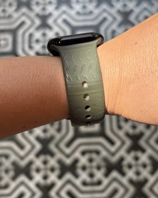 Olive Keffiyeh Apple Watch band by zamani, worn by a customer