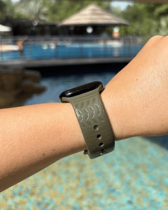 Olive Keffiyeh Apple Watch band by zamani, worn by a customer