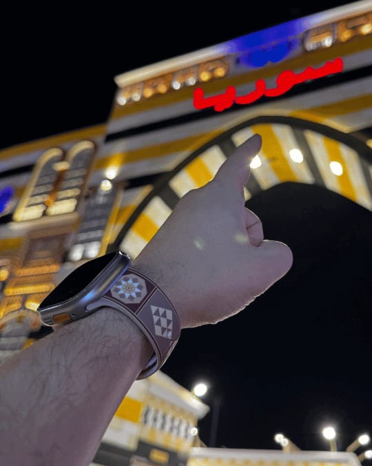 Wood Mosaic Apple Watch band by zamani, worn by a customer